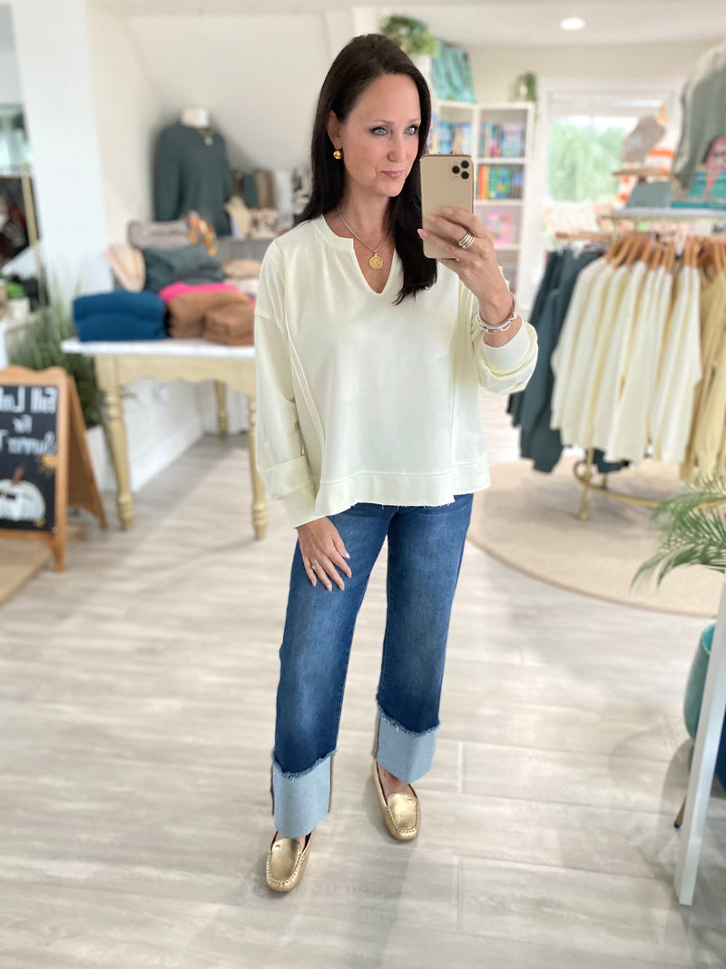 Washed V-Neck Exposed Seam Knit Top