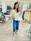 Washed V-Neck Exposed Seam Knit Top