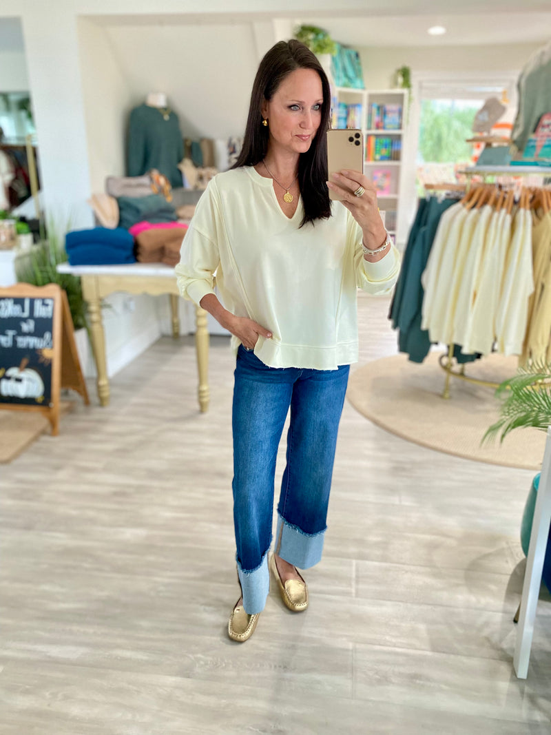 Washed V-Neck Exposed Seam Knit Top