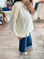 Washed V-Neck Exposed Seam Knit Top