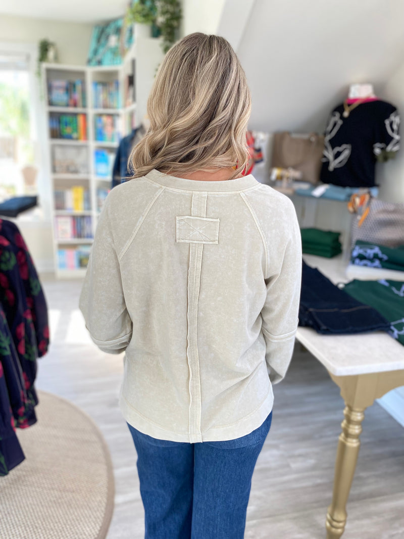 Washed Exposed Seam Knit Top